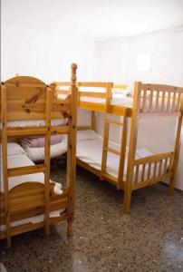 Katil dua tingkat atau katil-katil dua tingkat dalam bilik di Apartamento Cómodo y céntrico en Olot
