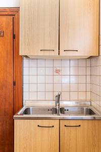 Kuhinja oz. manjša kuhinja v nastanitvi Appartamento Miramonti intero ristrutturato nuovo