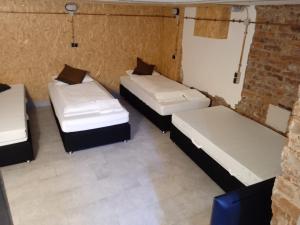 Voodi või voodid majutusasutuse #HANDWERKER_Rustikal Cityapartment Bielefeld Mitte toas