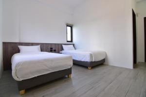 Letto o letti in una camera di 澎湖旅澄民宿 ph880Journey