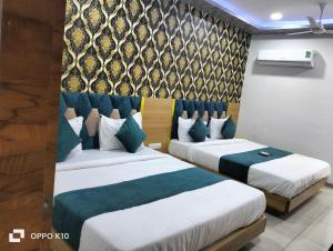 Voodi või voodid majutusasutuse hotel rudra palace toas