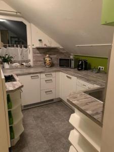 Kuchyň nebo kuchyňský kout v ubytování S&W Apartment Loserblick
