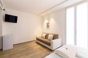 TV a/nebo společenská místnost v ubytování B&B FIERA "in cascina"