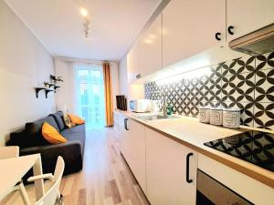 Kuchyňa alebo kuchynka v ubytovaní Hey Stay Apartment with private garden