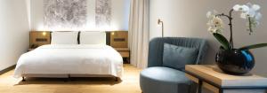 Postel nebo postele na pokoji v ubytování Vilnius Grand Resort