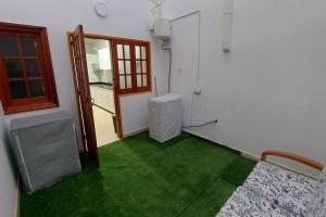 A bed or beds in a room at Casa La Palmera