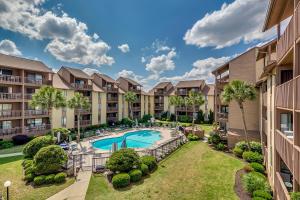 an aerial view of an apartment complex with a swimming pool at Anchorage II B02 in Myrtle Beach