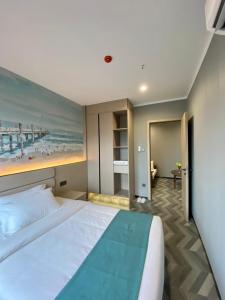 Postel nebo postele na pokoji v ubytování Fan's Hotel- Ormoc
