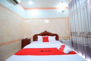 Postel nebo postele na pokoji v ubytování Chin Sao Hotel Nguyen Thi Thap