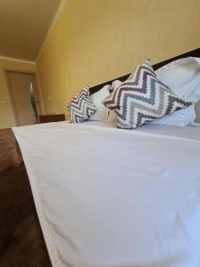 Кровать или кровати в номере Район Юбилейный - Боулинг