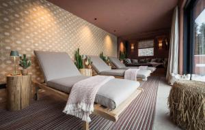a row of beds sitting in a room at Fernblick in Sankt Corona am Wechsel