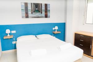 Postel nebo postele na pokoji v ubytování Apartamentos Turísticos Centro Histórico, by CartagenaSpain