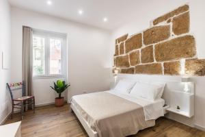 Posteľ alebo postele v izbe v ubytovaní Trisina Rooms