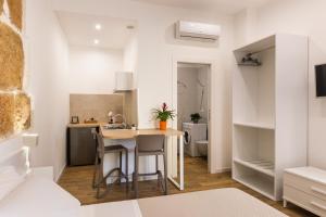 Kuchyňa alebo kuchynka v ubytovaní Trisina Rooms