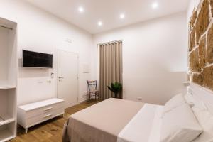 Posteľ alebo postele v izbe v ubytovaní Trisina Rooms