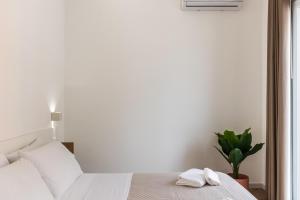 Posteľ alebo postele v izbe v ubytovaní Trisina Rooms