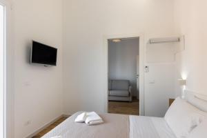 Posteľ alebo postele v izbe v ubytovaní Trisina Rooms