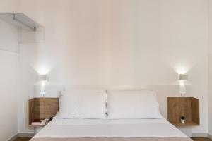 Posteľ alebo postele v izbe v ubytovaní Trisina Rooms