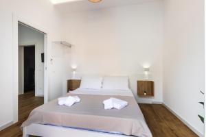 Posteľ alebo postele v izbe v ubytovaní Trisina Rooms