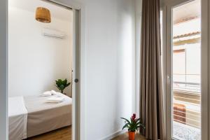 Posteľ alebo postele v izbe v ubytovaní Trisina Rooms