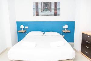 Postel nebo postele na pokoji v ubytování Apartamentos Turísticos Centro Histórico, by CartagenaSpain