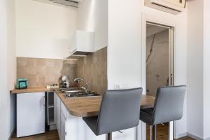 Kuchyňa alebo kuchynka v ubytovaní Trisina Rooms