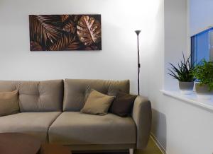 Ein Sitzbereich in der Unterkunft Modernes Apartment mit Queensize-Bett, NETFLIX, Küche, Erdgeschoss, Nähe AMEOS Klinik