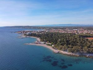 an aerial view of a small island in the water at Villa Ankora 2 with heated pool in Biograd na Moru