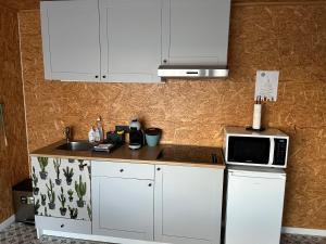 Kuchyň nebo kuchyňský kout v ubytování Studio 't Hoveke + 9 fotografií