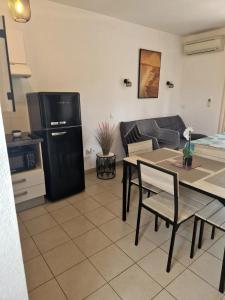 Kuchyňa alebo kuchynka v ubytovaní Appartement Poggio Mezzana