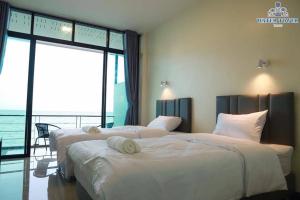 Postel nebo postele na pokoji v ubytování Phala Shore Resort