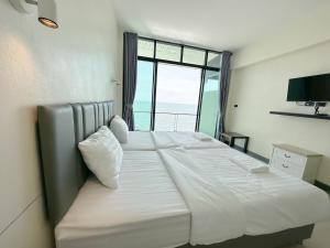 Postel nebo postele na pokoji v ubytování Phala Shore Resort