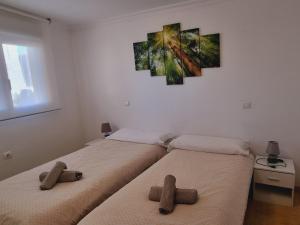 Posteľ alebo postele v izbe v ubytovaní Apartamento Puig Campana