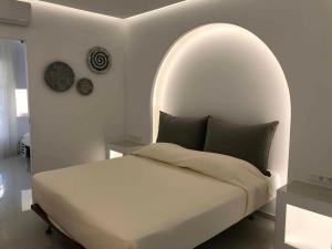 Postel nebo postele na pokoji v ubytování SeaRock Rooms and Suites