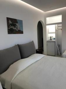 Kuchyň nebo kuchyňský kout v ubytování SeaRock Rooms and Suites
