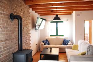 Posedenie v ubytovaní Villa Stone Pearl with heated swimming pool