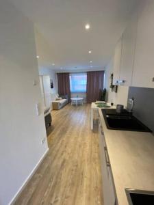 Un televizor și/sau centru de divertisment la Stylish luxus appartments in the city center