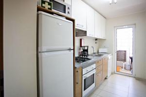 Кухня или мини-кухня в Apartamento Duja
