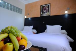 Een bed of bedden in een kamer bij Washington Hotel