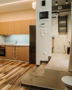 Kuchyňa alebo kuchynka v ubytovaní BLACKHAUS FAMILY AND FRIENDS DELUXE APARTMENT
