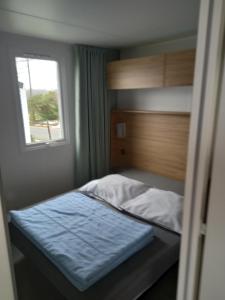 Postel nebo postele na pokoji v ubytování Camping Oos Heem