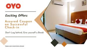 a hotel room with a bed with avertisement for at OYO Hotel Manning SC in Manning