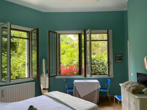 Postel nebo postele na pokoji v ubytování B&B Villa Ines