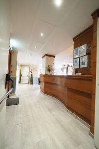 a lobby of a hospital with a counter at Hotel Laura in Rome