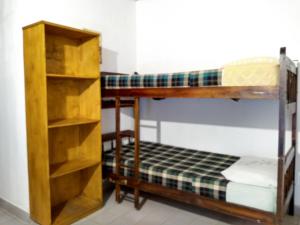 Un pat suprapus sau paturi suprapuse la Hosteria Las Piedras