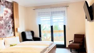 Postel nebo postele na pokoji v ubytování FeWo-Zimmer-Auszeit