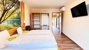 Postel nebo postele na pokoji v ubytování FeWo-Zimmer-Auszeit