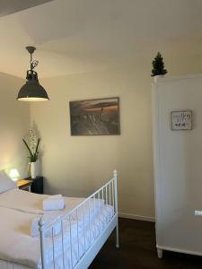 Ένα ή περισσότερα κρεβάτια σε δωμάτιο στο Beautiful flat with nice lake and mountain views