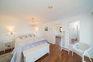 Posteľ alebo postele v izbe v ubytovaní Villa Belmonte FAMILY VILLA