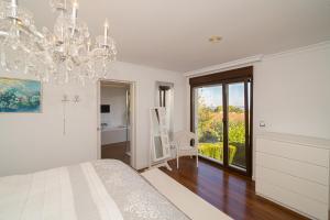 Posteľ alebo postele v izbe v ubytovaní Villa Belmonte FAMILY VILLA